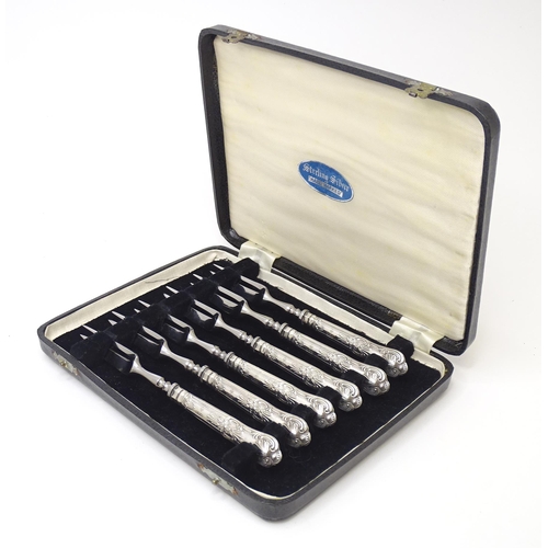 504 - A cased set of six silver handled King's pattern pastry forks, hallmarked Sheffield 1965, maker Harr... 