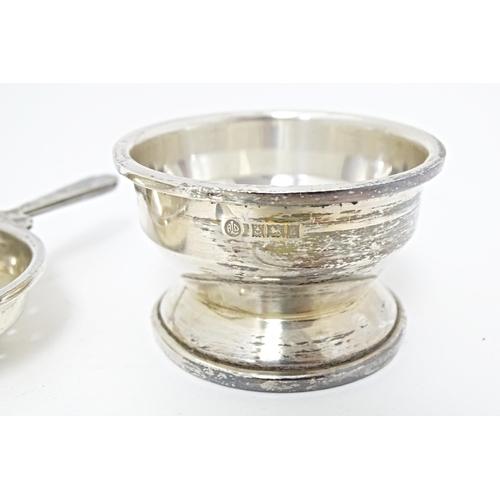 322 - An Art Deco style silver twin handled tea / lemon strainer with stand hallmarked Birmingham 1960, ma... 