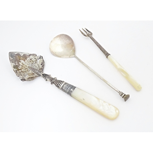 336 - A silver jam / preserve spoon with mother of pearl handle hallmarked Birmingham 1912, maker A. J. Ba... 