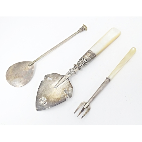 336 - A silver jam / preserve spoon with mother of pearl handle hallmarked Birmingham 1912, maker A. J. Ba... 