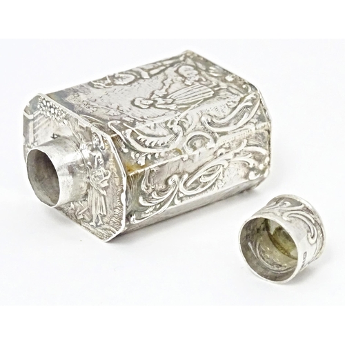 337 - A Continental silver miniature caddy / flask decorated with figures in a landscape. Import marks for... 