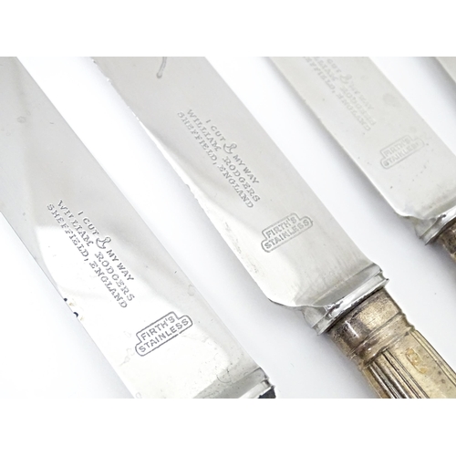 338 - A matched set of twelve Geo III and later silver handled table knives. Approx. 10 1/2