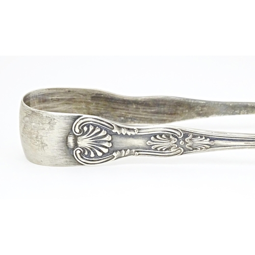 339 - Victorian silver fiddle pattern sugar tongs  hallmarked Exeter 1849 maker John Osment, together with... 