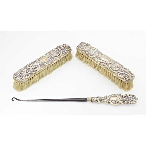 340 - Two Victorian silver backed brushes hallmarked Birmingham  1896/1898 maker William M Hayes together ... 