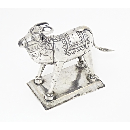 345 - An Indian white metal model of an cow  / ox. Approx. 3