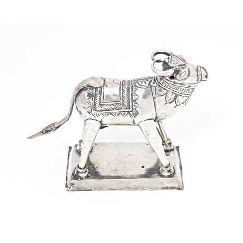 345 - An Indian white metal model of an cow  / ox. Approx. 3