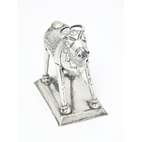 345 - An Indian white metal model of an cow  / ox. Approx. 3