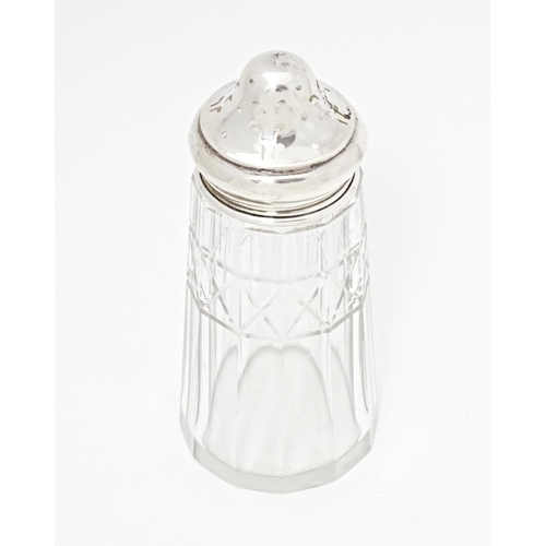 349 - A cut glass sugar sifter with silver lid hallmarked Birmingham 1913 maker Sydney & Co. Approx. 5 1/2... 