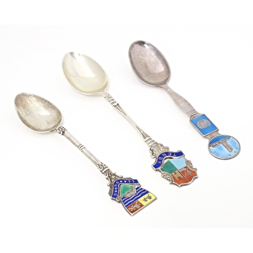 380 - Three silver souvenir spoons with enamel decoration, to include one by Th. Marthinsen of Norway titl... 