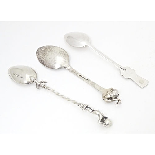 382 - Three assorted silver teaspoons one marked sterling with abalone shell detail to handle, one swan fi... 