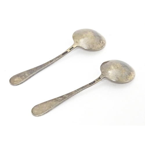 390 - A pair of Russian small silver salt spoons with enamel decoration. Approx. 2