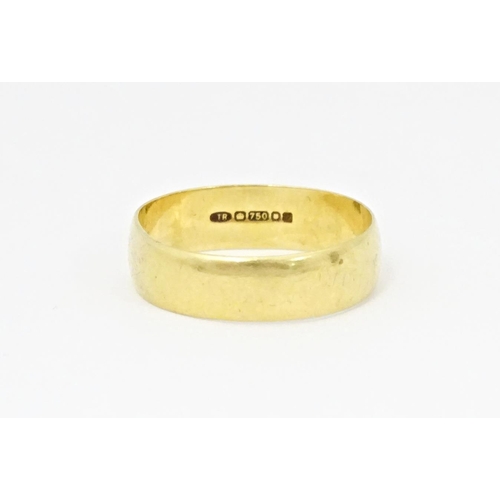 609 - An 18ct gold ring. Ring size approx. T