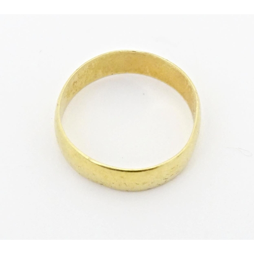 609 - An 18ct gold ring. Ring size approx. T