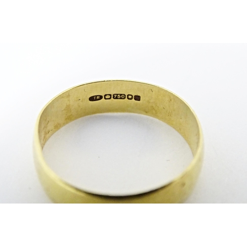 609 - An 18ct gold ring. Ring size approx. T