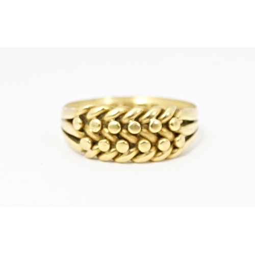 611 - An 18ct gold ring. Ring size approx. U