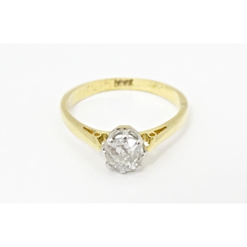 615 - An 18ct gold diamond solitaire ring. Diamond approx. 5mm wide. Ring size approx. J