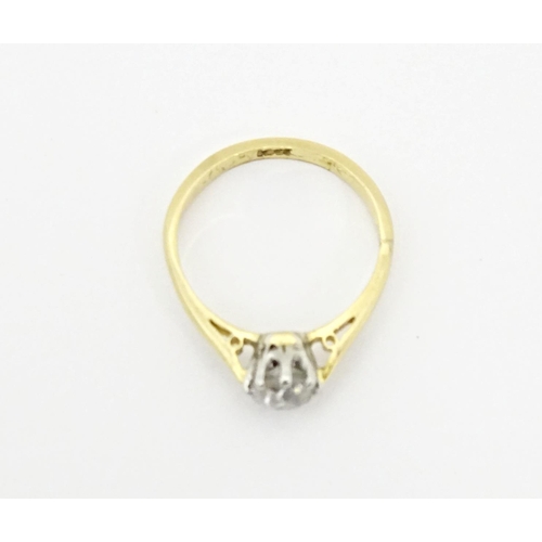 615 - An 18ct gold diamond solitaire ring. Diamond approx. 5mm wide. Ring size approx. J