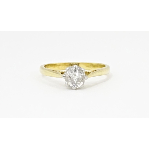 615 - An 18ct gold diamond solitaire ring. Diamond approx. 5mm wide. Ring size approx. J