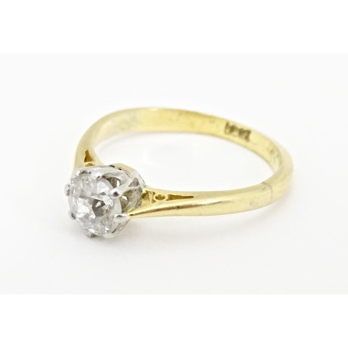 615 - An 18ct gold diamond solitaire ring. Diamond approx. 5mm wide. Ring size approx. J