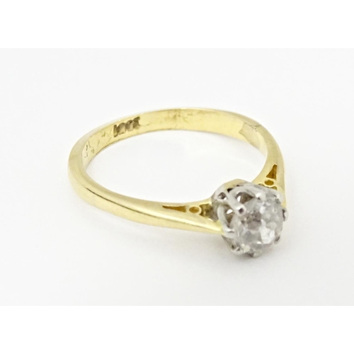 615 - An 18ct gold diamond solitaire ring. Diamond approx. 5mm wide. Ring size approx. J