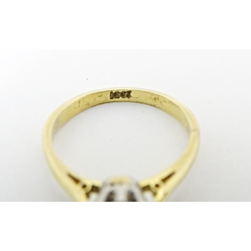 615 - An 18ct gold diamond solitaire ring. Diamond approx. 5mm wide. Ring size approx. J