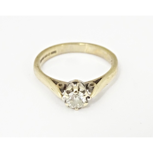 618 - A 9ct gold diamond solitaire ring set with brilliant cut diamond, approx. 0.25ct. Ring size approx. ... 