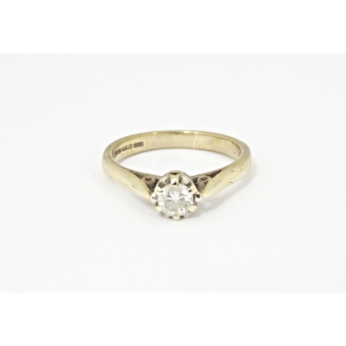 618 - A 9ct gold diamond solitaire ring set with brilliant cut diamond, approx. 0.25ct. Ring size approx. ... 