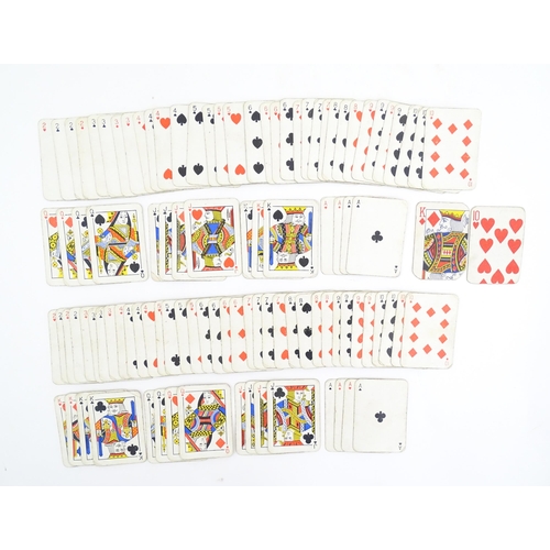 828 - Toys: A pack of 20thC playing cards for London Olympiad / Olympic Games 1948. Together with another ... 