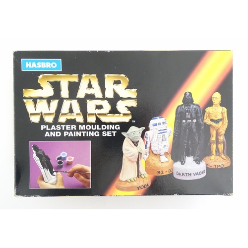 830 - Toys: A 1997 Hasbro Star Wars plaster moulding and painting kit, with moulds for characters Darth Va... 