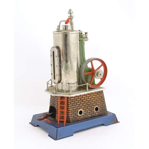 833 - Toy: A Wilesco model stationary steam engine. Stamped Made in Germany. Approx 12