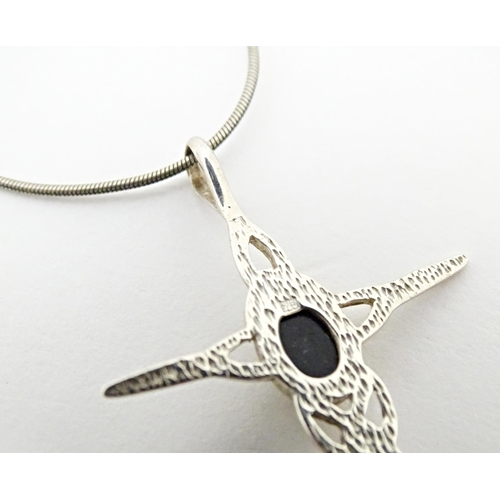 713 - Two silver pendants. Together with cross formed pendant and chain. Largest pendant approx. 2 1/2