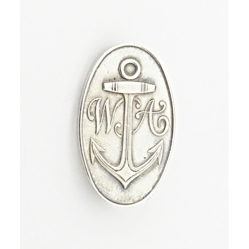 721 - A silver brooch of oval form with anchor detail and monogram WA. Hallmark Sheffield 2000. Approx 1 1... 