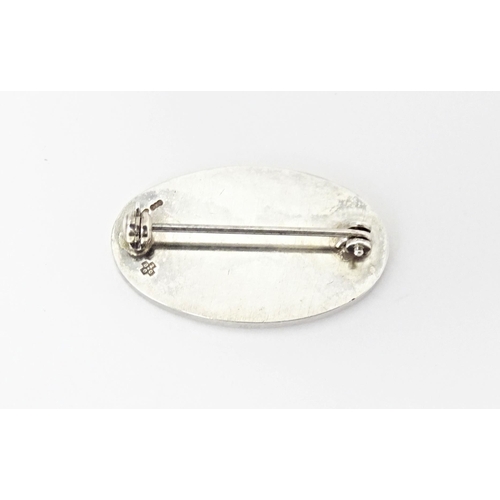 721 - A silver brooch of oval form with anchor detail and monogram WA. Hallmark Sheffield 2000. Approx 1 1... 