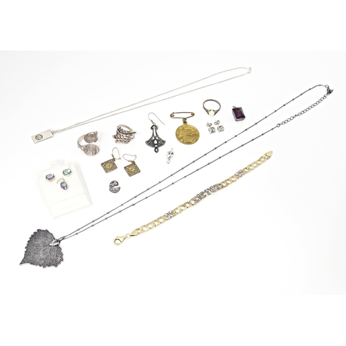 727 - A quantity of assorted jewellery, rings, necklace etc to include some silver examples