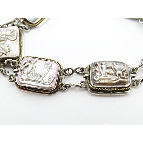 736 - A Continental .800 silver bracelet set with carved abalone shell panels depicting classical scenes. ... 