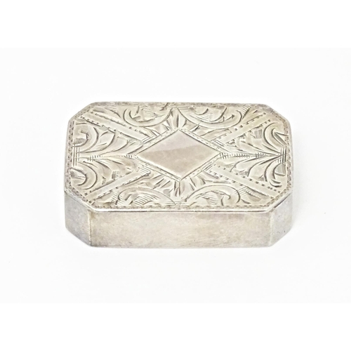 404 - An Elizabeth II silver pill box, hallmarked Birmingham 1953, maker D Bros. Approx. 1 1/4