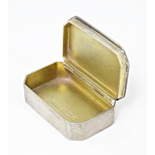 404 - An Elizabeth II silver pill box, hallmarked Birmingham 1953, maker D Bros. Approx. 1 1/4