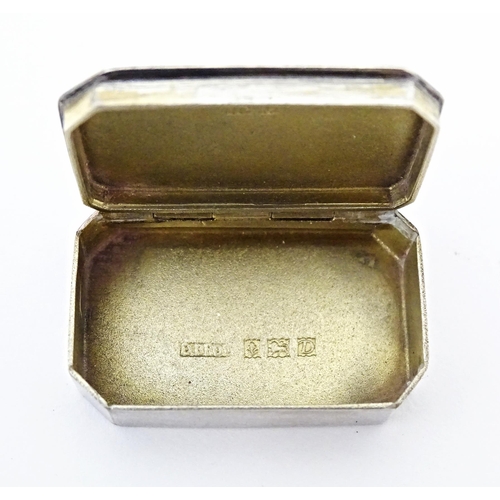 404 - An Elizabeth II silver pill box, hallmarked Birmingham 1953, maker D Bros. Approx. 1 1/4