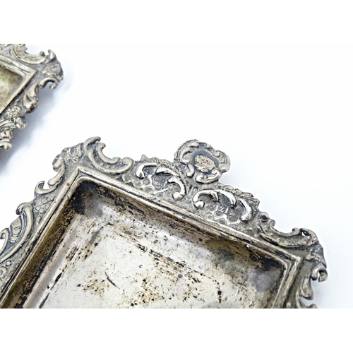 412 - A pair of Victorian silver pin dishes with embossed acanthus scroll decoration, hallmarked Birmingha... 