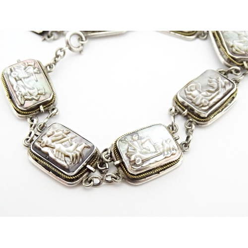 736 - A Continental .800 silver bracelet set with carved abalone shell panels depicting classical scenes. ... 