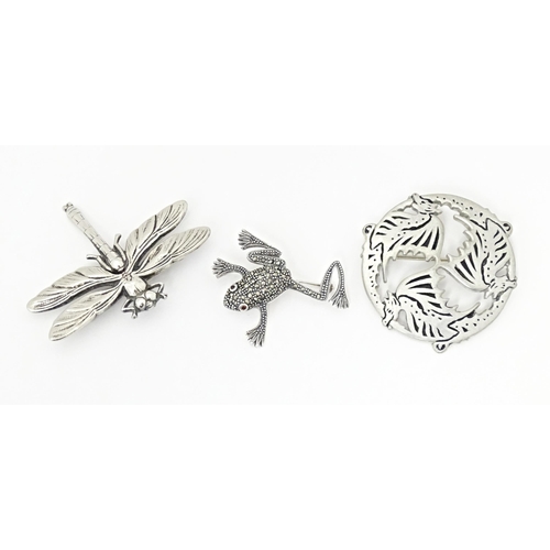 737 - Three assorted brooches to include a silver example formed as a frog with marcasite decoration. 2