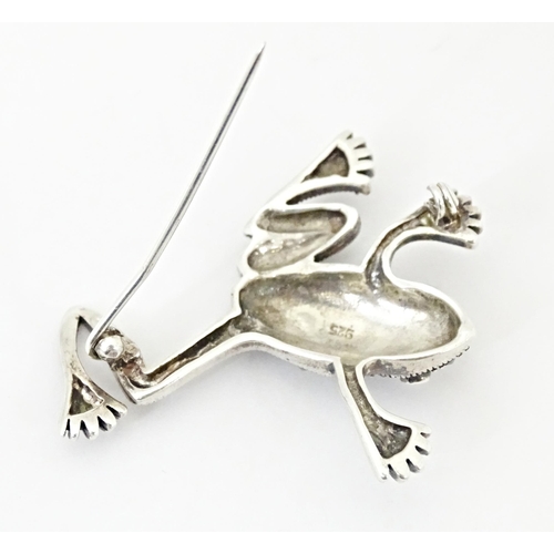 737 - Three assorted brooches to include a silver example formed as a frog with marcasite decoration. 2