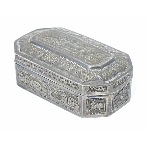 419 - A white metal snuff box with hinged lid and landscape decoration, possibly Indian / West Indies. App... 