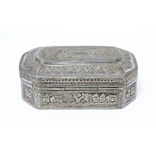 419 - A white metal snuff box with hinged lid and landscape decoration, possibly Indian / West Indies. App... 