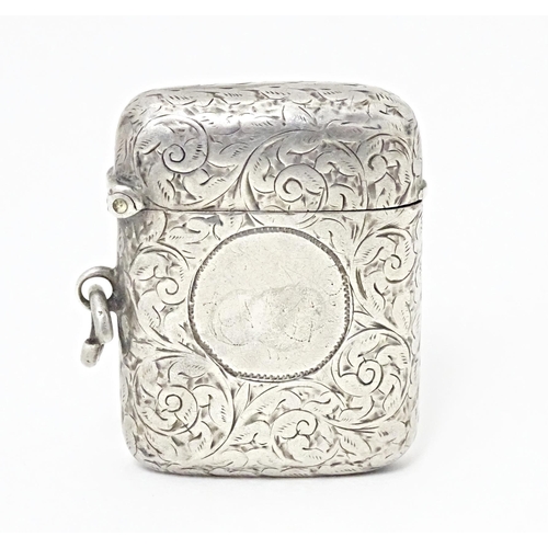 420 - A Victorian vesta case with engraved acanthus scroll decoration, hallmarked Birmingham 1897. Approx.... 