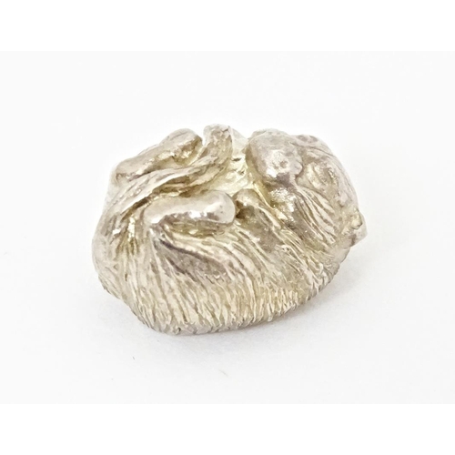 432 - A silver model of a dormouse, hallmarked Sheffield 2015. Approx. 1/2