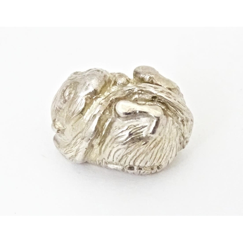 432 - A silver model of a dormouse, hallmarked Sheffield 2015. Approx. 1/2