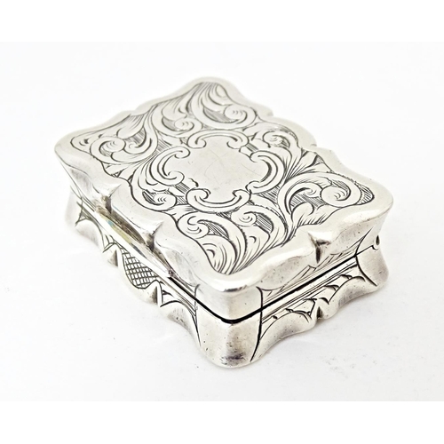 446 - A Victorian silver vinaigrette hallmarked Birmingham 1854, maker Hilliard & Thomason. 1 1/4