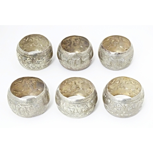 490 - A set of six white metal napkin rings with bird detail. Probably Indian (6)