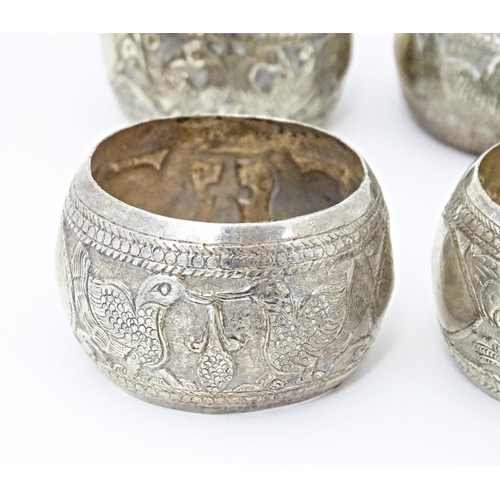 490 - A set of six white metal napkin rings with bird detail. Probably Indian (6)